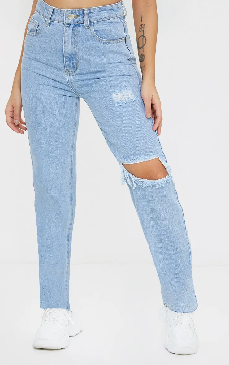 Petite Jean droit coupe longue très délavé à déchirure genou